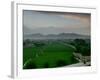 An Afghan Man Rides His Bicycle on a Dirt Road on the Northern Edge of Kabul, Afghanistan-David Guttenfelder-Framed Photographic Print