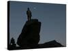 An Afghan Man Stands on a Huge Rock Next to the Now Abad Dinazung Monument-Rodrigo Abd-Stretched Canvas