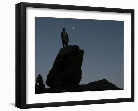 An Afghan Man Stands on a Huge Rock Next to the Now Abad Dinazung Monument-Rodrigo Abd-Framed Photographic Print