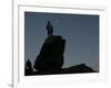 An Afghan Man Stands on a Huge Rock Next to the Now Abad Dinazung Monument-Rodrigo Abd-Framed Photographic Print