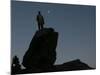 An Afghan Man Stands on a Huge Rock Next to the Now Abad Dinazung Monument-Rodrigo Abd-Mounted Photographic Print
