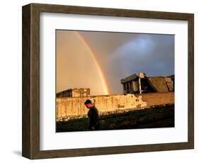 An Afghan Man Walks Past Destroyed Buildings Occupied by Refugees after a Heavy Rain-null-Framed Photographic Print