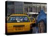 An Afghan Woman Clad in a Burqa Walks Next to a Taxi in Kabul, Afghanistan, Wednesday, June 7, 2006-Rodrigo Abd-Stretched Canvas