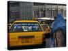 An Afghan Woman Clad in a Burqa Walks Next to a Taxi in Kabul, Afghanistan, Wednesday, June 7, 2006-Rodrigo Abd-Stretched Canvas