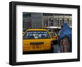 An Afghan Woman Clad in a Burqa Walks Next to a Taxi in Kabul, Afghanistan, Wednesday, June 7, 2006-Rodrigo Abd-Framed Photographic Print