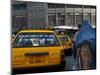 An Afghan Woman Clad in a Burqa Walks Next to a Taxi in Kabul, Afghanistan, Wednesday, June 7, 2006-Rodrigo Abd-Mounted Photographic Print