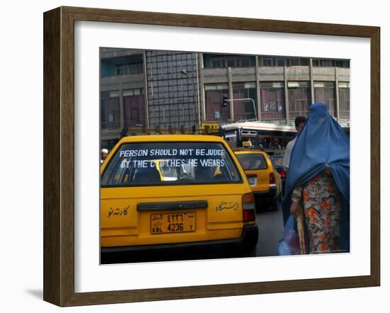 An Afghan Woman Clad in a Burqa Walks Next to a Taxi in Kabul, Afghanistan, Wednesday, June 7, 2006-Rodrigo Abd-Framed Photographic Print