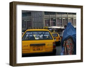 An Afghan Woman Clad in a Burqa Walks Next to a Taxi in Kabul, Afghanistan, Wednesday, June 7, 2006-Rodrigo Abd-Framed Photographic Print