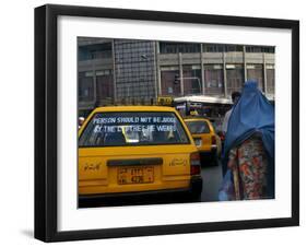 An Afghan Woman Clad in a Burqa Walks Next to a Taxi in Kabul, Afghanistan, Wednesday, June 7, 2006-Rodrigo Abd-Framed Photographic Print