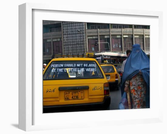 An Afghan Woman Clad in a Burqa Walks Next to a Taxi in Kabul, Afghanistan, Wednesday, June 7, 2006-Rodrigo Abd-Framed Photographic Print