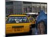 An Afghan Woman Clad in a Burqa Walks Next to a Taxi in Kabul, Afghanistan, Wednesday, June 7, 2006-Rodrigo Abd-Mounted Photographic Print