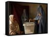 An Afghan Woman Wearing a Burqa Casts Her Ballot at a Polling Station-null-Framed Stretched Canvas