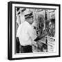 An African American Pokes His Finger into a Bullet Hole in the Oakland Black Panther's Headquarters-null-Framed Photo