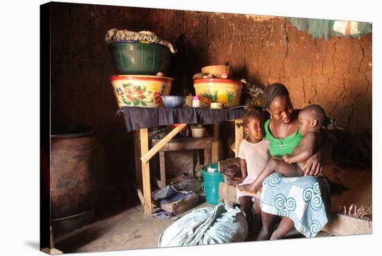 An African mother and her children, Tori, Benin-Godong-Stretched Canvas