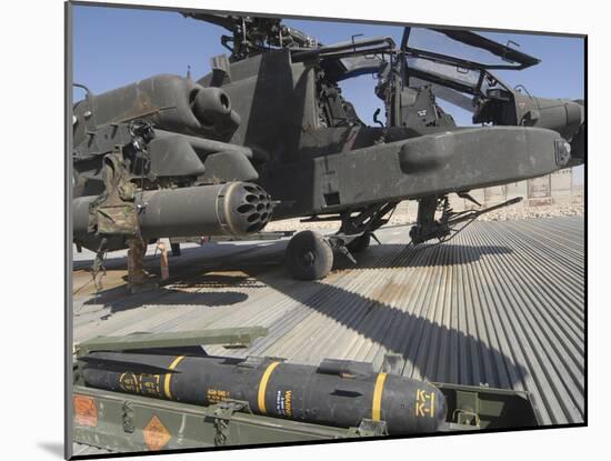 An AGM-114 Hellfire Missile Is Ready to Be Loaded onto an AH-64 Apache-Stocktrek Images-Mounted Photographic Print
