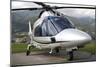 An Agustawestland A109 Power Elite Helicopter-null-Mounted Photographic Print