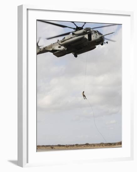 An Air Force Pararescueman Conducts a Combat Insertion and Extraction Exercise in Djibouti, Africa-null-Framed Photographic Print