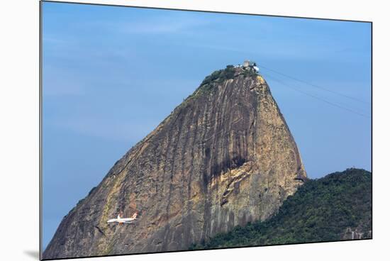 An Airliner Flies beneath Sugarloaf Mountain, Rio De Janeiro.-Jon Hicks-Mounted Photographic Print