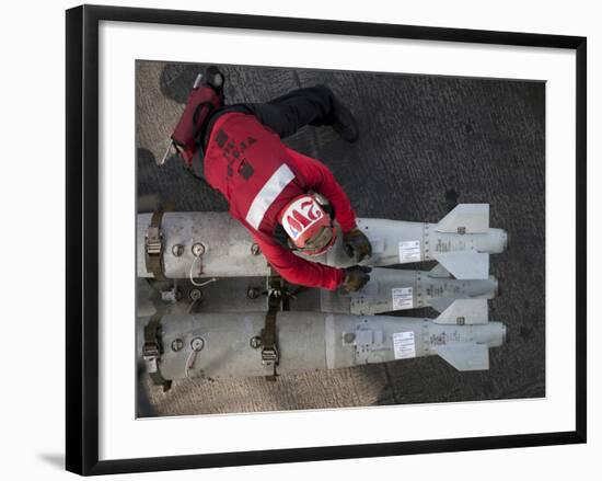 An Airman Moves Ordnance On the Flight Deck of the Aircraft Carrier USS Carl Vinson-Stocktrek Images-Framed Photographic Print