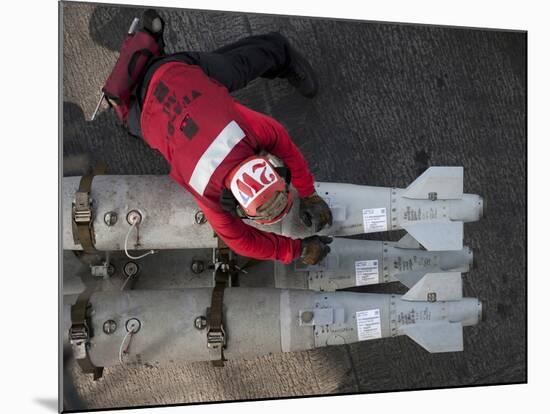 An Airman Moves Ordnance On the Flight Deck of the Aircraft Carrier USS Carl Vinson-Stocktrek Images-Mounted Photographic Print