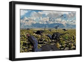 An Allosaurus Attacking a Herd of Camptosaurus Dinosaurs-null-Framed Art Print