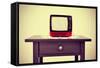 An Ancient Red Television on a Table with a Retro Effect-nito-Framed Stretched Canvas