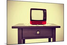An Ancient Red Television on a Table with a Retro Effect-nito-Mounted Photographic Print