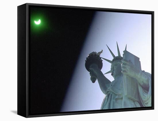 An Annular Eclipse Passes Above the Statue of Liberty-null-Framed Stretched Canvas