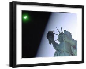 An Annular Eclipse Passes Above the Statue of Liberty-null-Framed Photographic Print