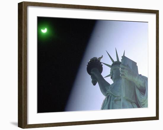 An Annular Eclipse Passes Above the Statue of Liberty-null-Framed Photographic Print