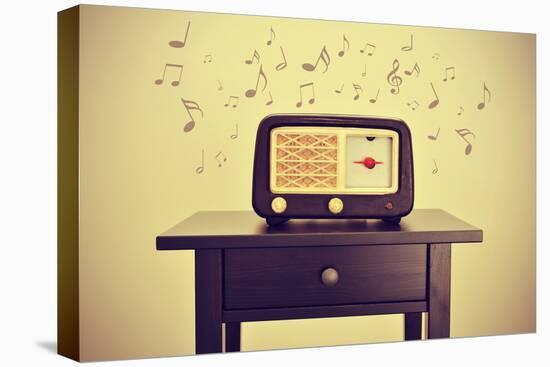 An Antique Radio Receptor on a Desk and Musical Notes, with a Retro Effect-nito-Stretched Canvas