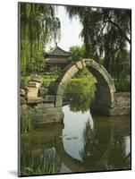 An Arched Bridge at Yuanmingyuan, Beijing, China-Kober Christian-Mounted Photographic Print