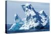 An arched iceberg floating in Gerlache Strait, Antarctica.-Paul Souders-Stretched Canvas