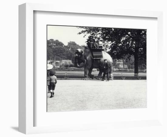 An Asian Elephant Being Ridden by Two Ladies and a Young Girl-Frederick William Bond-Framed Photographic Print