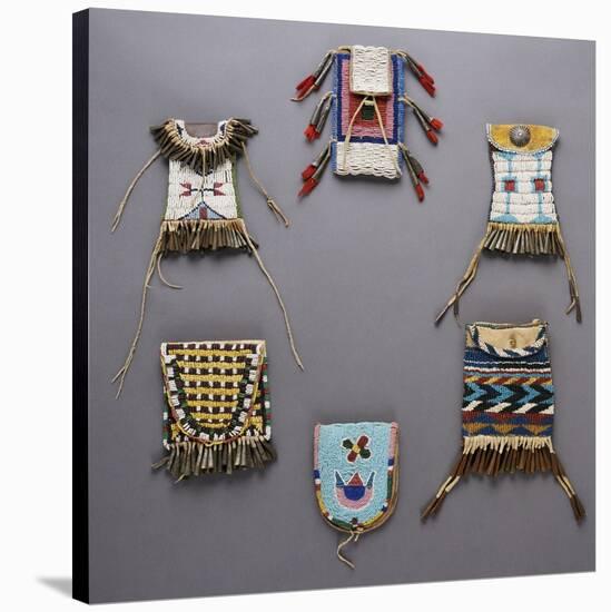 An Assortment of Kiowa, Sioux, Cheyenne, Crow, and Apache Beaded Hide Belt Pouches-null-Stretched Canvas