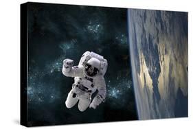 An Astronaut Floating Above Earth-Stocktrek Images-Stretched Canvas