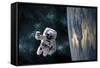 An Astronaut Floating Above Earth-Stocktrek Images-Framed Stretched Canvas