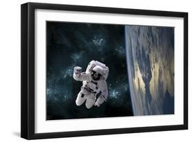 An Astronaut Floating Above Earth-Stocktrek Images-Framed Photographic Print