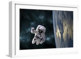 An Astronaut Floating Above Earth-Stocktrek Images-Framed Photographic Print