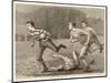 An Attacking Player Charges Forward with the Ball Chased by Two Opposing Players-W.b. Wall-Mounted Art Print