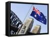 An Australian Flag Flutters in Breeze in Front of Iconic Sydney Harbour Bridge, Sydney-Andrew Watson-Framed Stretched Canvas