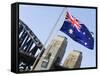 An Australian Flag Flutters in Breeze in Front of Iconic Sydney Harbour Bridge, Sydney-Andrew Watson-Framed Stretched Canvas