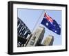 An Australian Flag Flutters in Breeze in Front of Iconic Sydney Harbour Bridge, Sydney-Andrew Watson-Framed Photographic Print