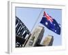 An Australian Flag Flutters in Breeze in Front of Iconic Sydney Harbour Bridge, Sydney-Andrew Watson-Framed Photographic Print