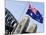 An Australian Flag Flutters in Breeze in Front of Iconic Sydney Harbour Bridge, Sydney-Andrew Watson-Mounted Photographic Print