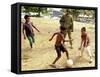 An Australian Soldier Plays with Displaced East Timorese Children-null-Framed Stretched Canvas