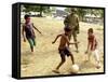 An Australian Soldier Plays with Displaced East Timorese Children-null-Framed Stretched Canvas