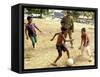 An Australian Soldier Plays with Displaced East Timorese Children-null-Framed Stretched Canvas