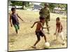 An Australian Soldier Plays with Displaced East Timorese Children-null-Mounted Photographic Print