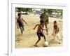 An Australian Soldier Plays with Displaced East Timorese Children-null-Framed Photographic Print